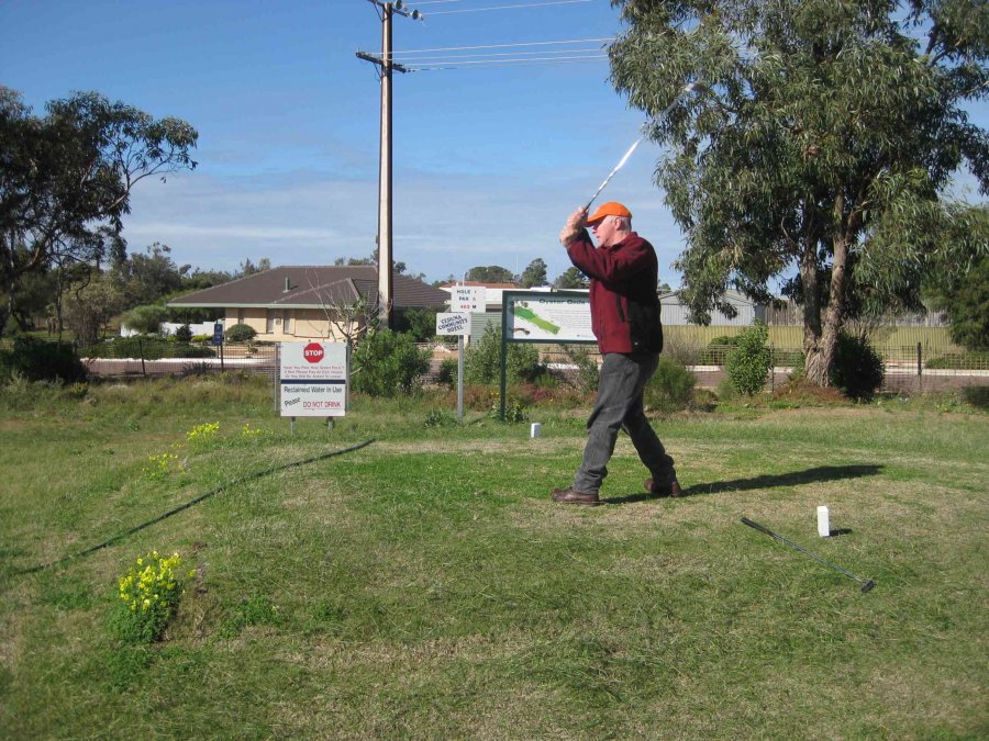 Michael playing the first hole of the Nullarbor Links at Ceduna